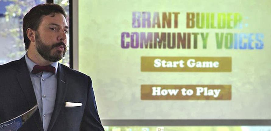 A speaker giving a lecture on community