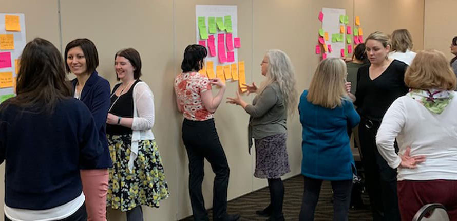 A group of women talking to each other