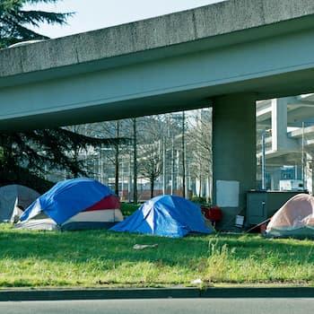 From NIMBY to neighbour: Brokering a dialogue about homelessness among people experiencing homelessness, law enforcement, and the community at large
