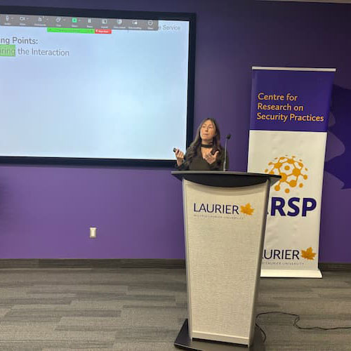 Holly Campeau presenting a lecture